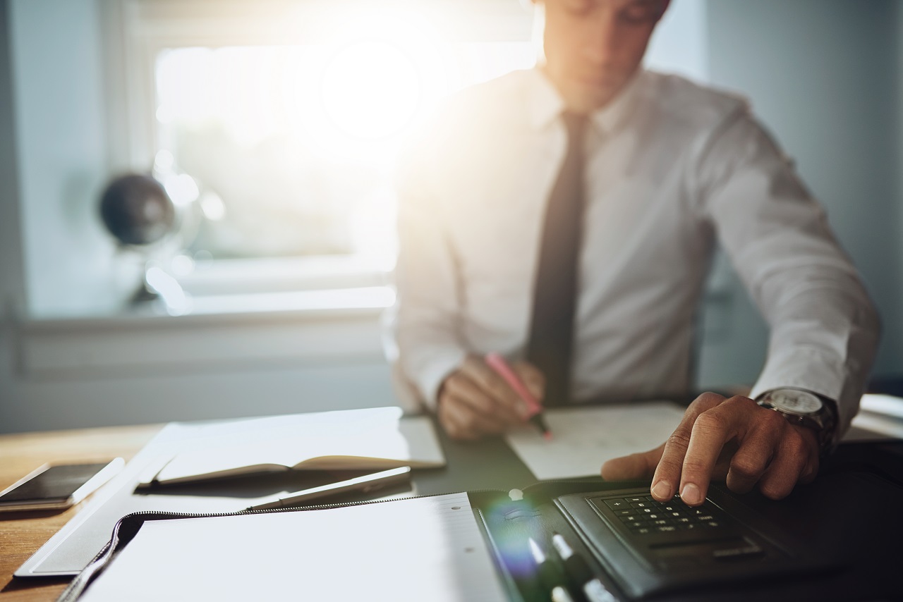 Business man working on documents, close up